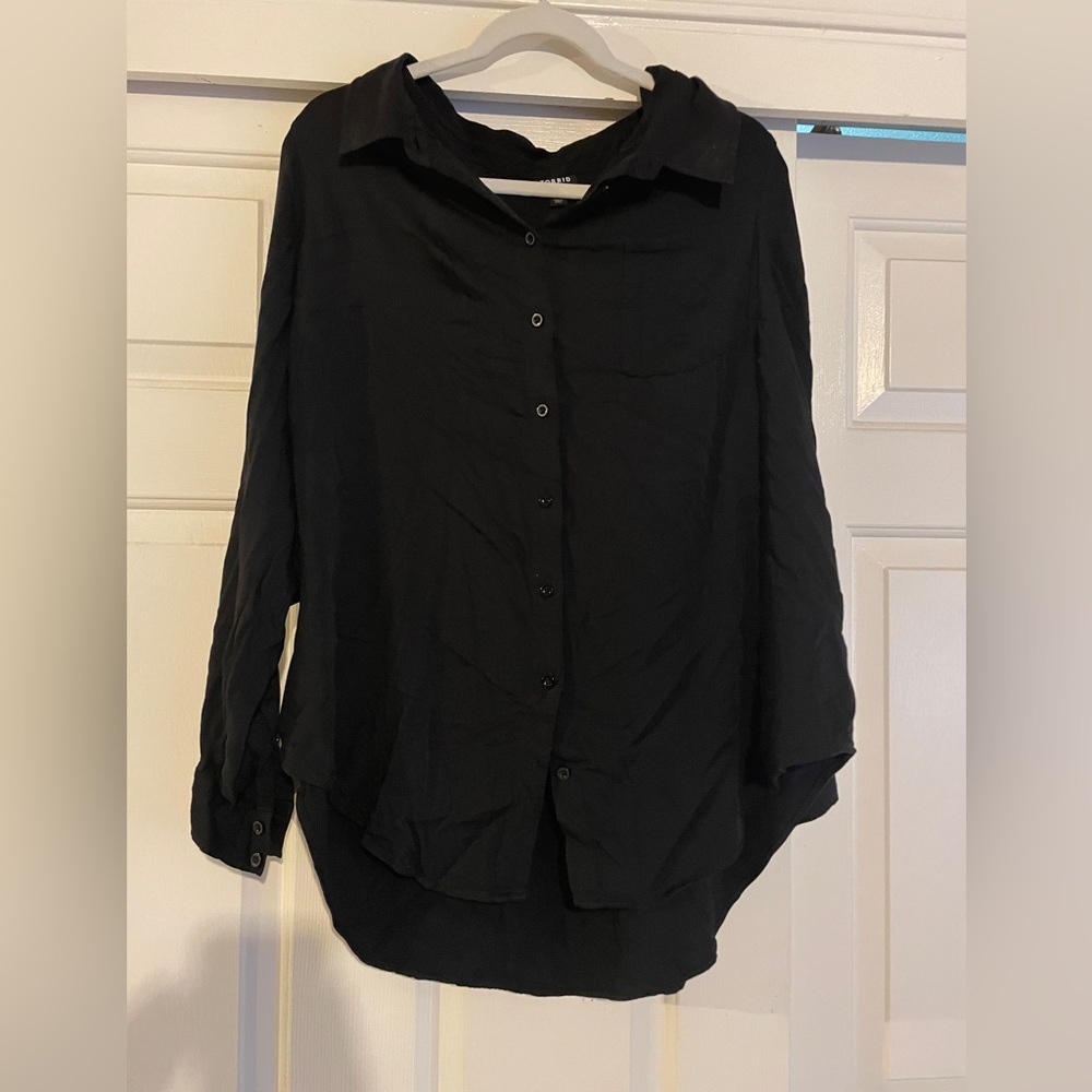 Torrid
Black Button Down Long sleeve
Great Condition
Used once